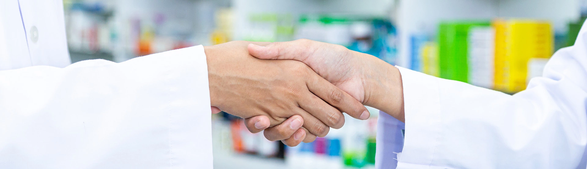 Pharmacists shaking hands