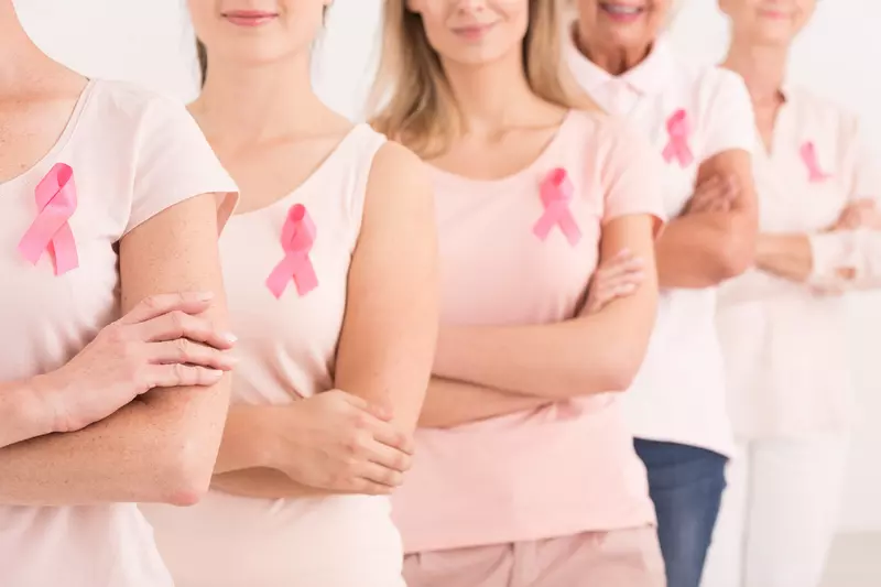 women wearing pink for breast cancer awareness