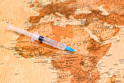 syringe on map of Africa